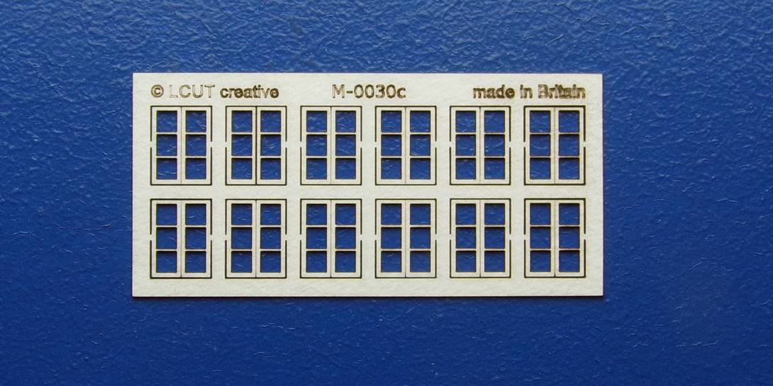 M 00-30c OO gauge kit of 12 casement windows Kit of 12 casement windows. Made with high quality fiber board 0.7mm thick.
